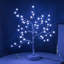Bonsaï avec arbres et branches éclairés-88410164