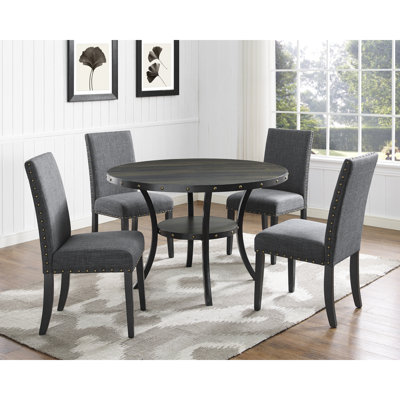 Ensemble de salle à manger en bois Biony avec chaises cloutées en tissu