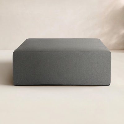 Hania Upholstered Outdoor Ottoman with Sunbrella® Cushion