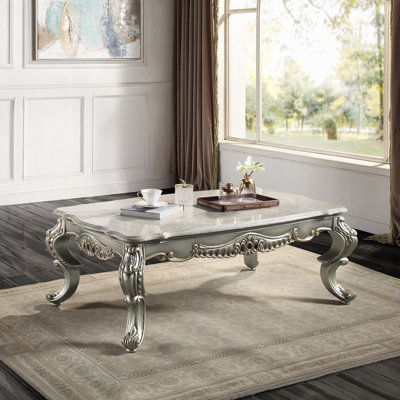 Table basse, marbre naturel et finition bronze antique