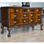 Commode triple boules et griffes en acajou