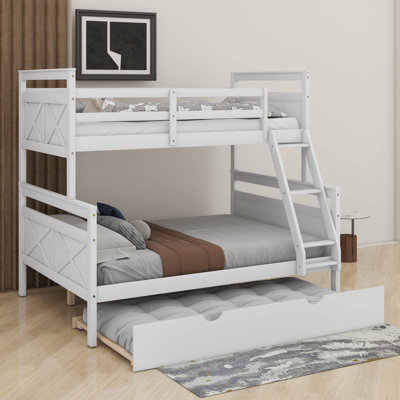Lit simple superposé au dessus d'un lit double avec lit gigogne simple et barrière de sécurité