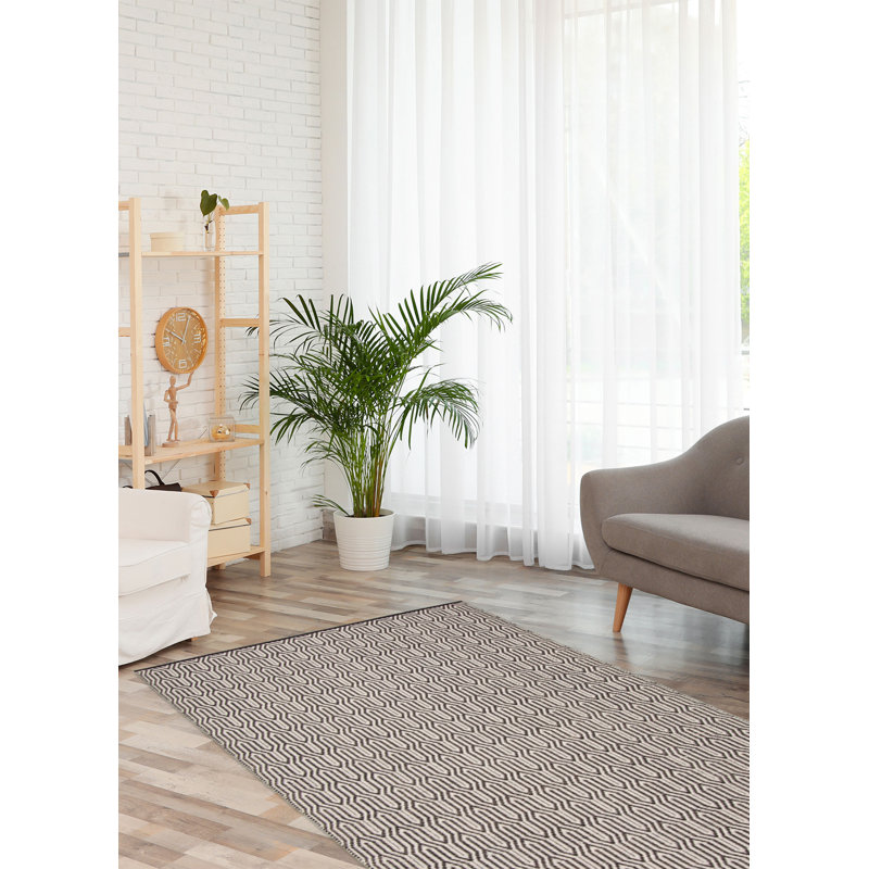 Plush comfort with an artisan-crafted look and texture. Soft, lustrous yarns are hand woven to create an array of textures, including oversized loops and flat surfaces that are rich in dimension.
