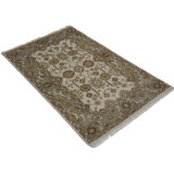 Pasleigh Oriental Area Rug in Cream