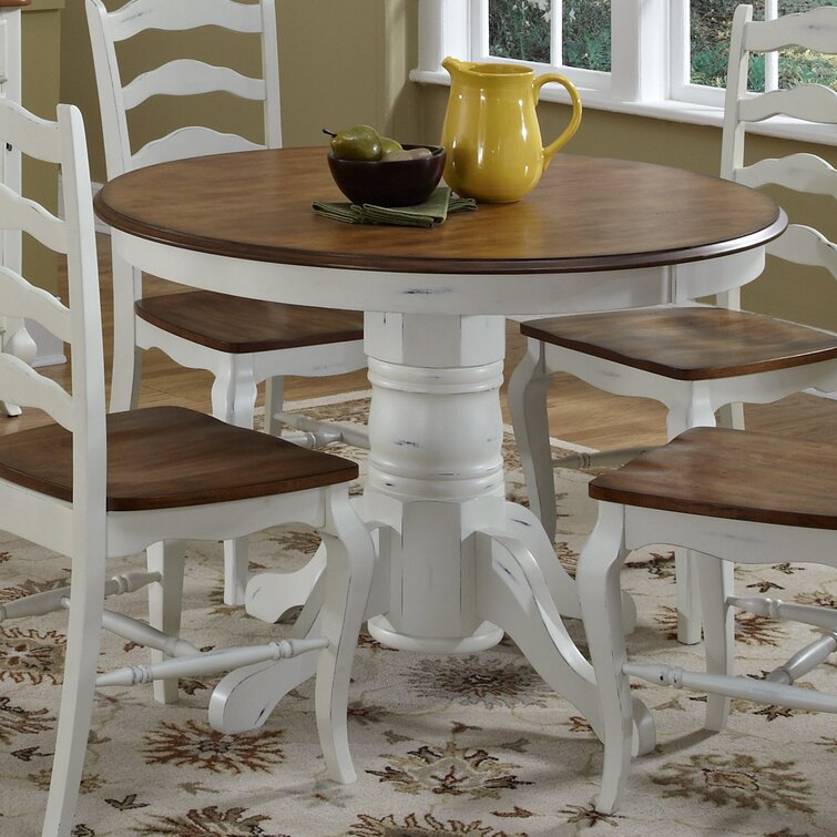 https://assets.wfcdn.com/im/77837800/resize-h755-w755%5Ecompr-r85/4641/46414914/Anjelita+Round+Solid+Wood+Dining+Table.jpg