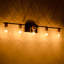 Luminaire de luxe pour salle de bain et couloir, noir mat et or, design américain, avec abat-jour en verre.