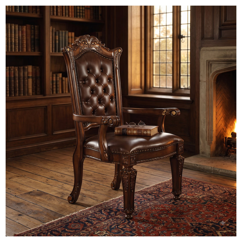 Fauteuil de direction Valenza en merisier, dossier capitonné, structure en bois sculpté et garniture cloutée