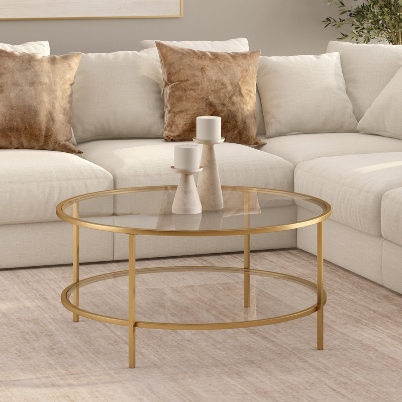 Sivil 36" Wide Round Coffee Table with Glass Top in Brass, Gold