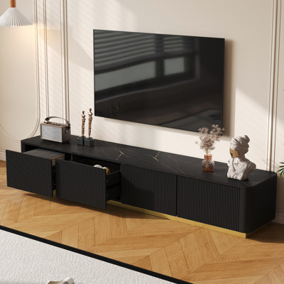 Fluted Tv Stand For 85 Inch Tvs, Black Faux Marble Veneer, 4 Drawers, Gold Base, Curved Profile, And Stylish Modern Stand, Design, Top, Structure, Easy To Maintain