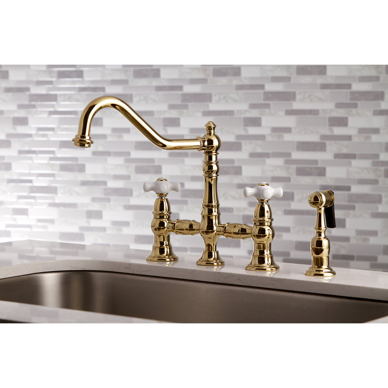 Kingston Brass Restoration Two-Handle 4-Hole Deck Mount Bridge Kitchen Faucet with Brass Side Sprayer, Polished Brass