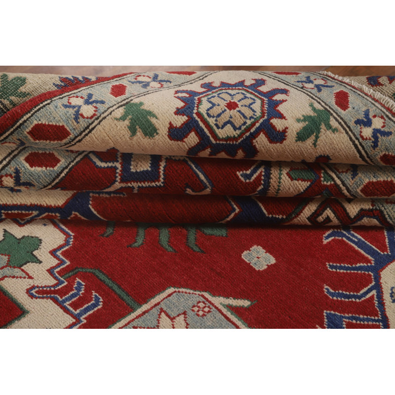 Tapis rouge à motif oriental Kazak