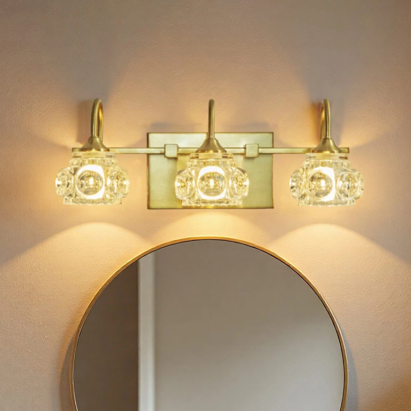 Éclairage pour meuble-lavabo à 3 lumières 18 po or et métal avec abat-jour en verre transparent 18 po (ampoules non incluses)