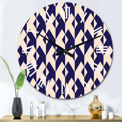 Horloge murale rose et noire à motif géométrique triangulaire