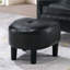 Fauteuil contemporain noir rembourré et assorti, ressort en S, sangle, quincaillerie, convient pour créer une nappe ouatée en fibres, mousse, ajoute un attrait visuel à la pièce