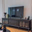 Élégant meuble télé en verre arqué massif-106973869-106973868