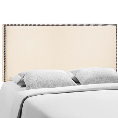 Tête de lit tapissier cloutée