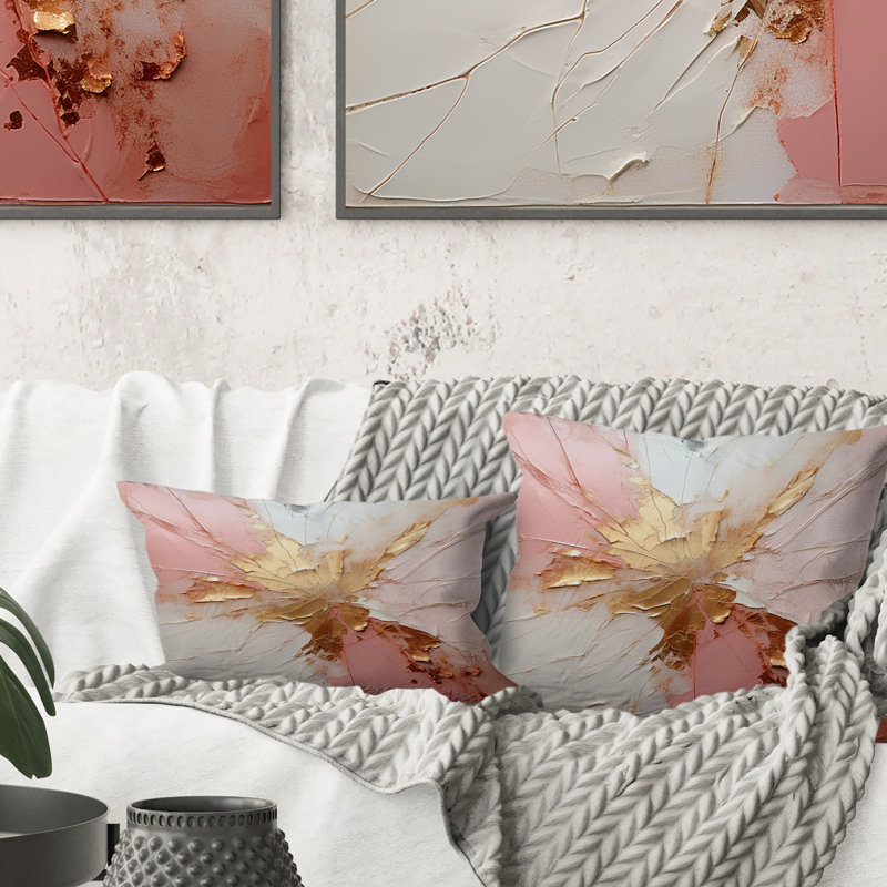 Coussin décoratif or et rose avec peinture abstraite