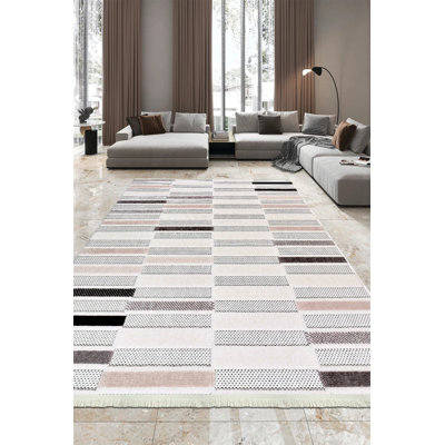 Tapis crème moderne en polyester Eberhart résistant aux taches et facile à nettoyer
