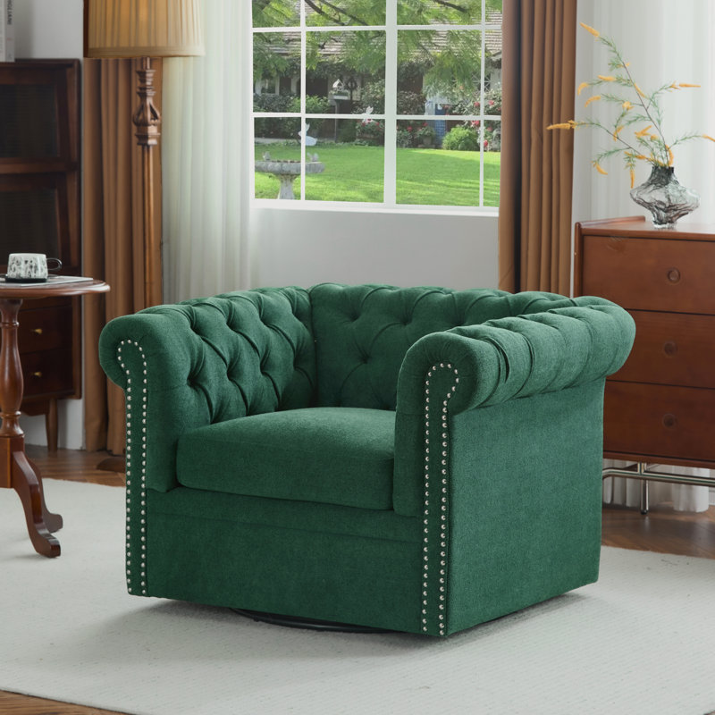 Fauteuil club pivotant rembourré Danyiel Chesterfield