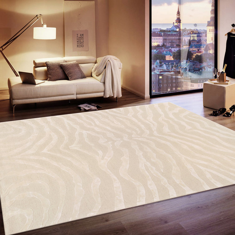 Tapis ivoire / ivoire touffeté à la main à imprimé animal