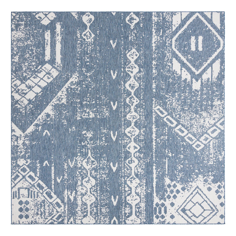Bonnetta Geometric Machine Woven Polypropylene Indoor / Outdoor Area Rug in Blue/Ivory