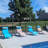 Outdoor Rust-Resistant Metal Chaise Lounge with Table-422563368