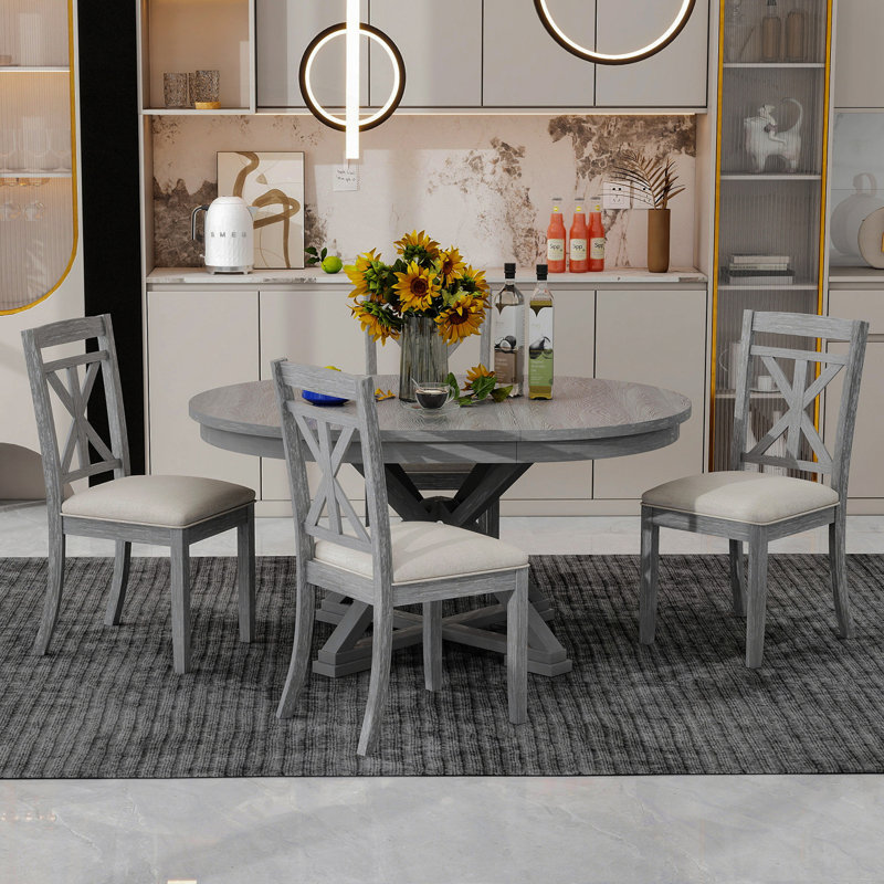 Ensemble de table de salle à manger extensible 5 pièces avec chaises rembourrées, parfait pour une salle à manger élégante et fonctionnelle