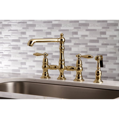 Kingston Brass English Country Two-Handle 4-Hole Deck Mount Bridge Kitchen Faucet with Brass Side Sprayer