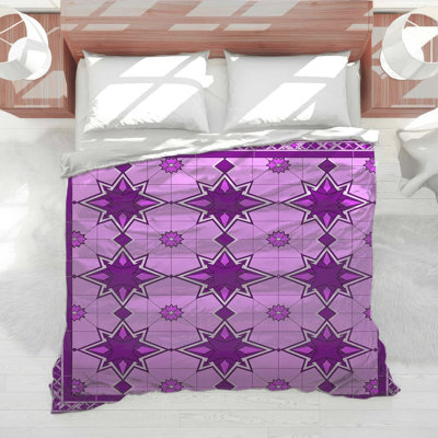 Édredon mauve à motif d'étoiles