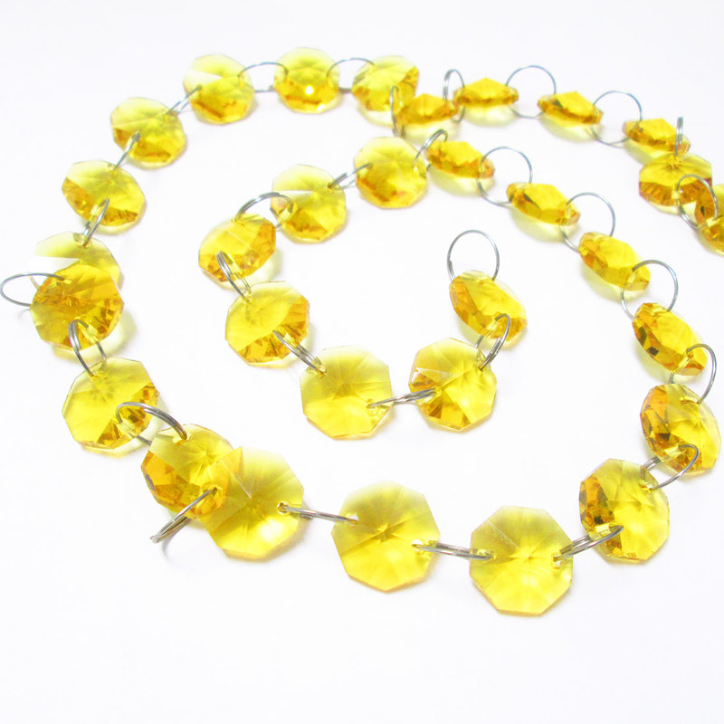 Ornement en forme de guirlande de perles en cristal