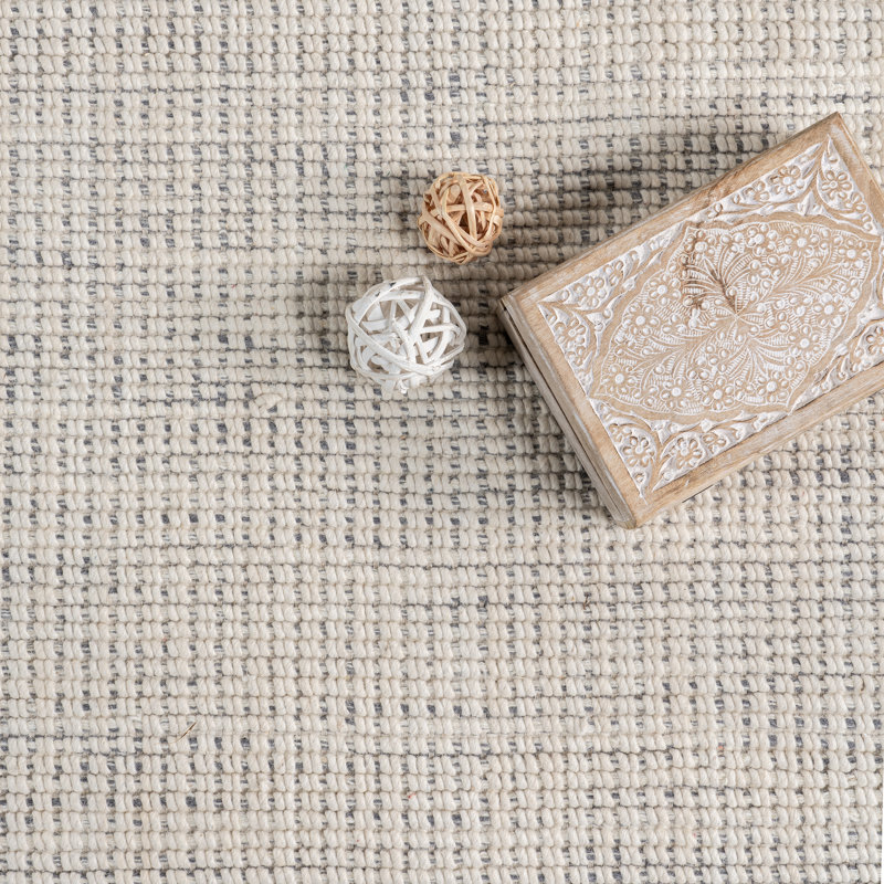 Handmade Ivory Wool Rectangular Area Rug with Fringe