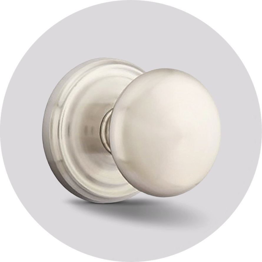 Satin nickel round door knob with a decorative circular backplate.