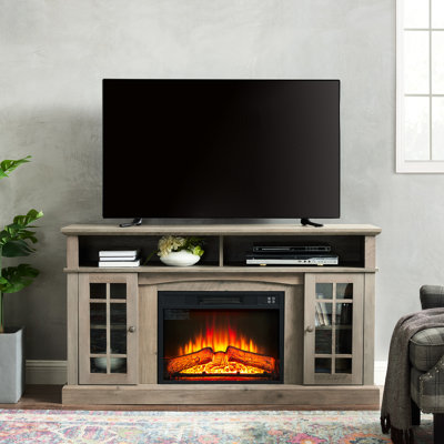 Meuble télé en gris délavé avec fonction foyer, pour console de 65 po. Peut contenir 3 réglages de luminosité de la flamme. L 59,57 po x P 15,94 po x H 32 po