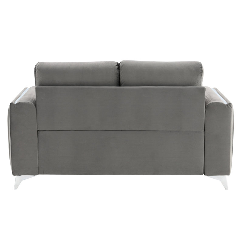Velours gris avec coussins confortables et repose-pieds en métal offrant des pieds luxueux et confortables