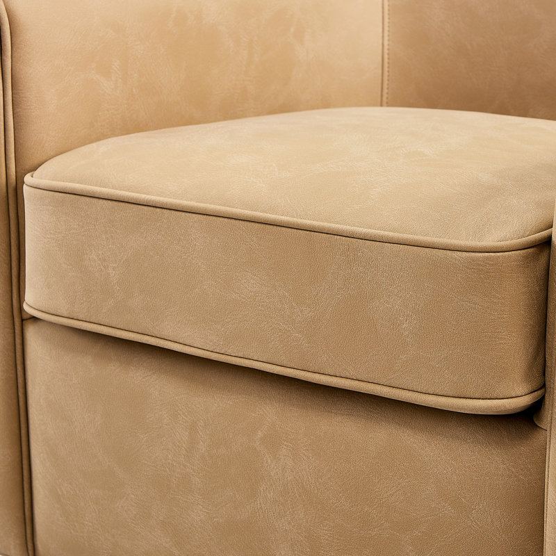 Fauteuil d'appoint en similicuir brun pivotant à 360°, dossier arrondi, surpiqûres décoratives, coutures passepoilées, assise à ressorts, coussin d'assise amovible, patins de sol, aucun assemblage requis.