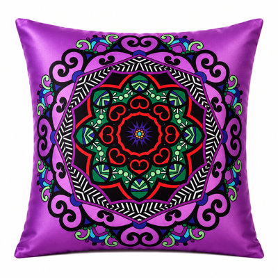 Imprimé kaléidoscope sur coussin mauve