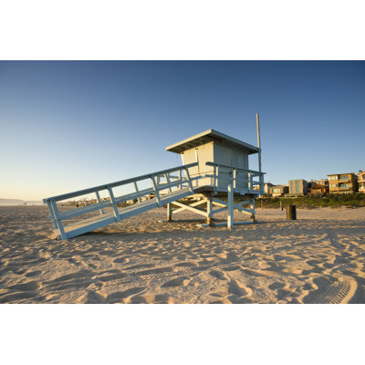 Lifeguard Tower At Sunset by Tsebourn - Wrapped Canvas Print