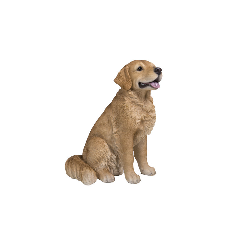 Statue golden retriever assis
