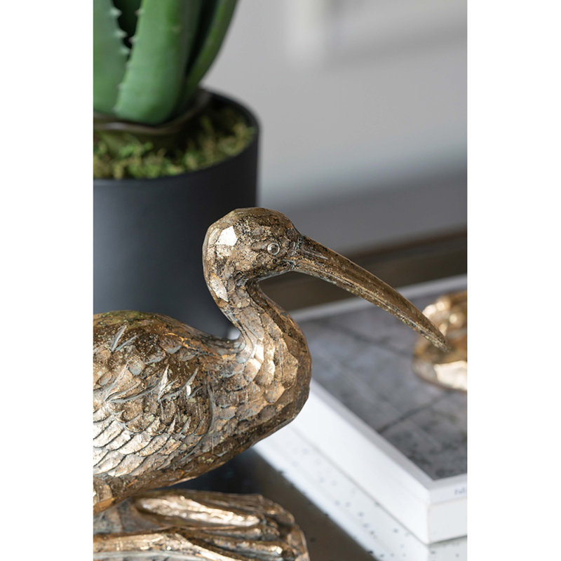 Figurine de grue, finition dorée