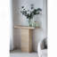 Table basse avec base piédestal