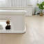 Table basse ouverte pour un rangement efficace