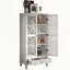 Grande armoire de rangement rustique sculptée-304457184