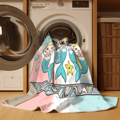 Tapis pour enfant East Urban Home Mermaids