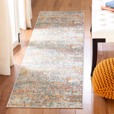 Follett Abstract Area Rug