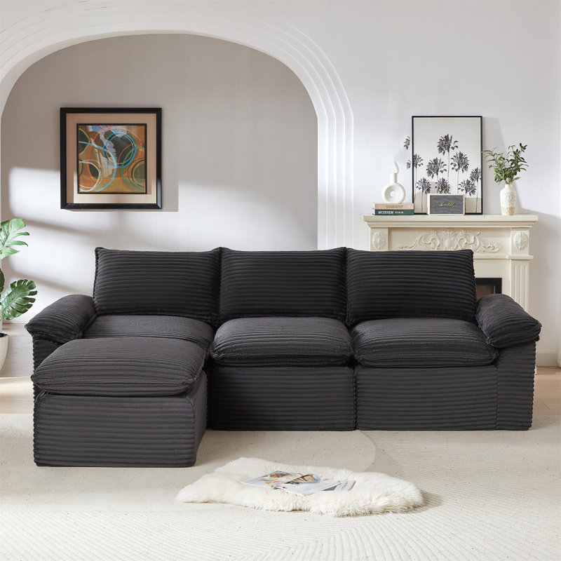 Canapé moderne en velours côtelé avec un confort moelleux, une silhouette élégante et une configuration modulaire pour des espaces de vie polyvalents.