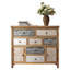Commode rétro avec bois patiné et motifs ornés