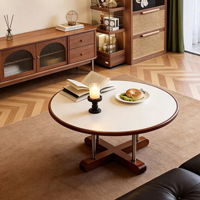 Table basse ronde blanche et brune en bois massif