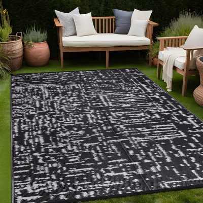 Tapis d'extérieur en plastique noir et blanc Aldo