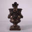 Statue de petits anges en bronze et urne lion-128961936