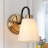 Lidia Iron Armed Sconce
